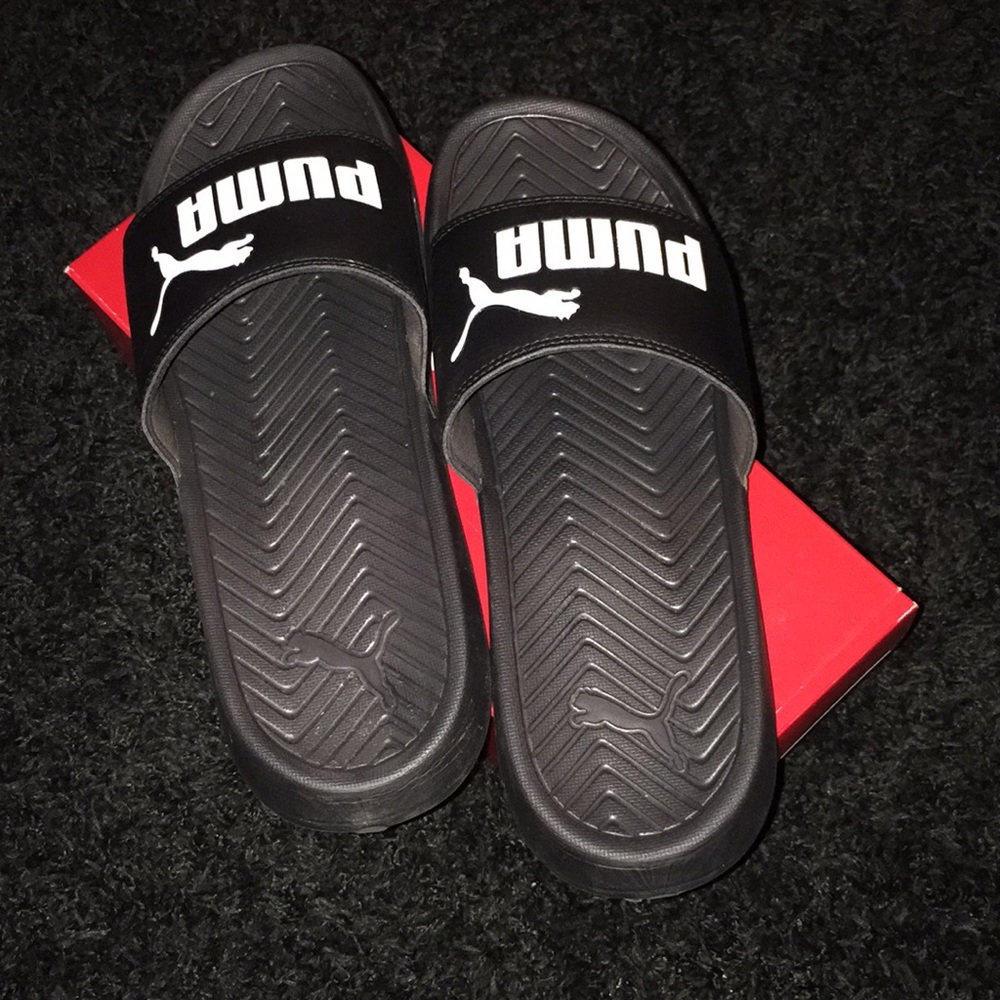 Black and white puma slides
